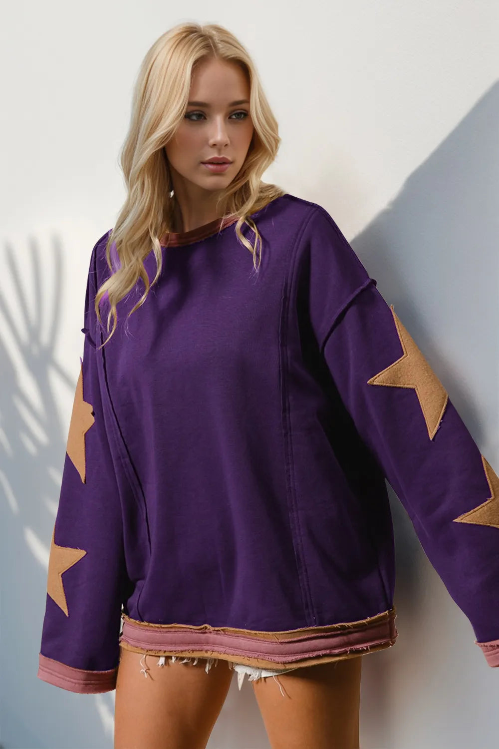 Double Take Star Patched Long Sleeve Sweatshirt.