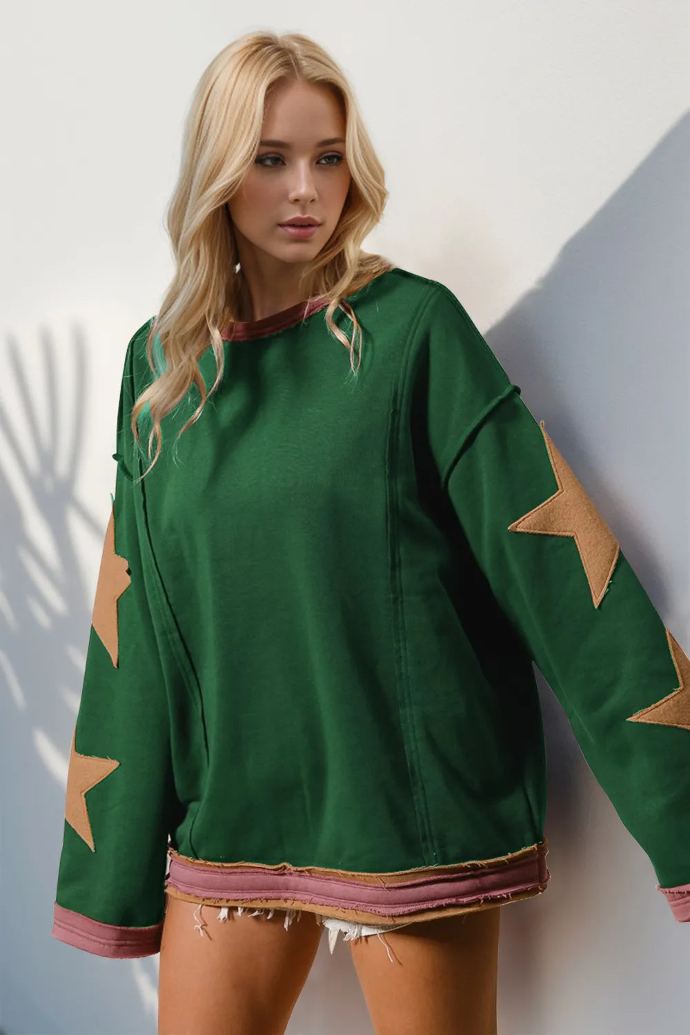 Double Take Star Patched Long Sleeve Sweatshirt.